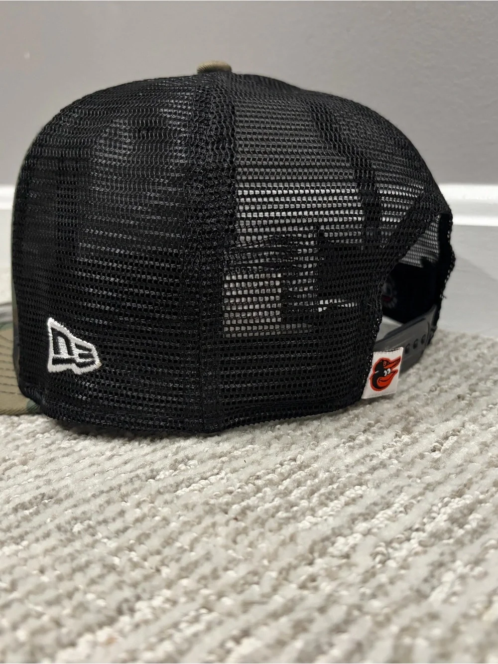 MLB Camo Snapback Trucker Hat with Orange Orioles Logo